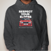 a person wearing a grey hoodie with a red car and white text